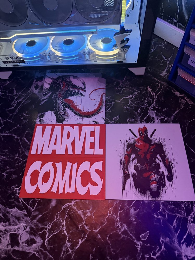 Marvel Comics sign with Deadpool and Venom prints